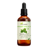 Groene thee olie 100 ml van Aza Natural, fles van donker glas met pipet en een etiket met een takje theeblaadjes