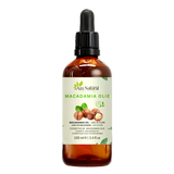 Huile de macadamia 100 ml Aza Natural, flacon en verre foncé avec pipette, étiquette avec noix de macadamia et une feuille