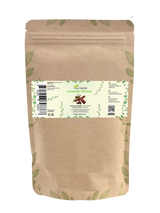 Zak shikakai poeder van Aza Natural, 250 gram, kraftpapier met ritssluiting en een etiket met gedroogde shikakai-peulen