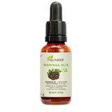 Fles moringa olie van Aza Natural, 30 ml, donker glas met pipet en een etiket met bruine moringazaden en groene blaadjes