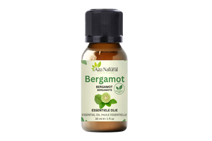 Fles bergamot olie van Aza Natural, 30 ml, bruin glas met zwarte dop en een etiket met een groene bergamotvrucht
