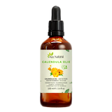 Calendula olie 100 ml van Aza Natural, fles van donker glas met pipet en een etiket met oranje goudsbloemen
