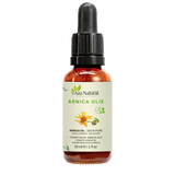 Flacon d’huile d’arnica Aza Natural, 30 ml, verre foncé avec pipette et une étiquette avec une fleur d’arnica jaune