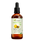 Ximenia olie 100 ml van Aza Natural, fles van donker glas met pipet en een etiket met een geeloranje zuurpruim en een pit