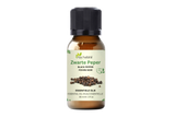 Zwarte peper olie 30 ml van Aza Natural, flesje van bruin glas met zwarte dop en een etiket met getekende peperkorrels