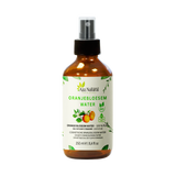 Fläschchen Orangenblütenwasser von Aza Natural, 250 ml, braunes Glas mit Sprühkopf und ein Etikett mit Orangen und Blüten