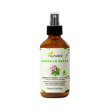 Flacon d’eau de géranium Aza Natural, 250 ml, verre brun avec spray et une étiquette avec des fleurs de géranium roses